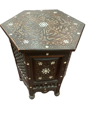 Lot 1558 - 19th century carved and bone inlaid table in the Moorish style