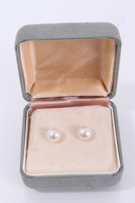 Lot 718 - Pair of cultured button pearl stud earrings with a 7.8mm pearl