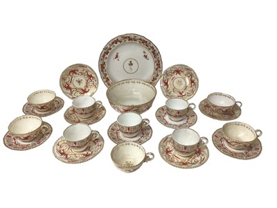 Lot 330 - Crown Derby part tea set, early 19th century, decorated with foliate patterns in iron red and gold, the centre of the plate with a bust and crown above the initial 'S'