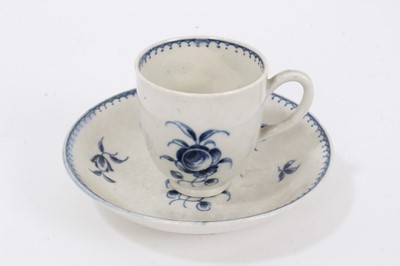 Lot 335 - An 18th century Worcester child's blue and white cup and saucer, decorated with floral sprays, crescent marks to bases, the cup 5cm high