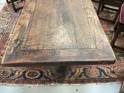 Lot 1523 - Substantial Italian walnut refectory table, the cleated plank top on pyramidal column supports