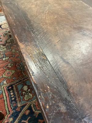 Lot 1523 - Substantial Italian walnut refectory table, the cleated plank top on pyramidal column supports