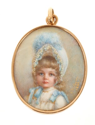 Lot 653 - 19th century portrait miniature on ivory depicting a portrait of a child, signed and dated 1888, in a glazed gold pendant frame with mother of pearl back, 49mm.