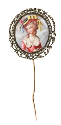 Lot 655 - 18th century enamel portrait miniature depicting a lady holding a bird, the oval enamel panel within a frame set with rose cut brilliants in silver with gold back, later stick pin fitting. The fram...