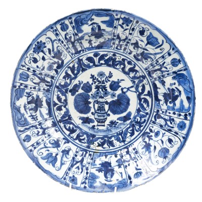 Lot 346 - Chinese blue and white Kraak porcelain dish, late Ming, decorated with panels of figures and flowers, 32cm diameter