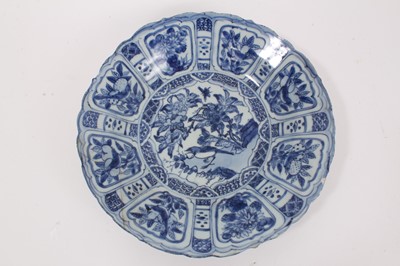 Lot 347 - Chinese blue and white Kraak porcelain dish, late Ming, decorated with panels of birds and flowers, 30cm diameter