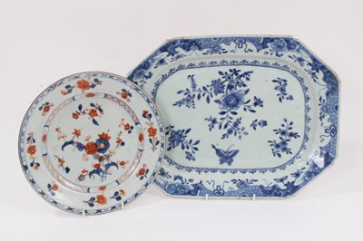 Lot 352 - 18th century Chinese blue and white porcelain platter, decorated with a butterfly amongst flowers, 35.5cm wide, together with an 18th century Chinese Imari plate, 23cm diameter (2)