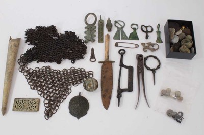 Lot 1033 - Collection of artefacts, generally mediaeval or later, including early thimbles, lead corn seals, portion of chain mail, various ornate mounts etc