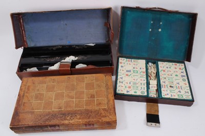 Lot 1035 - Antique bone and bamboo mahjong set, cased