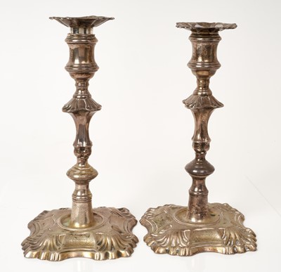 Lot 544 - Pair George II cast silver candlesticks, with knopped columns on shaped bases