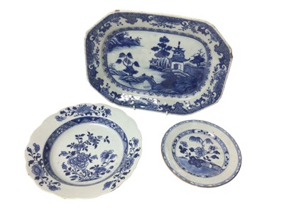 Lot 378 - Three pieces of 18th century Chinese blue and white export porcelain, including a platter, a plate and a small dish (3)