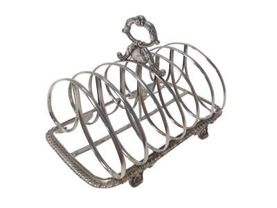 Lot 557 - Early Victorian silver toast rack, London 1839