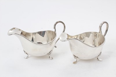 Lot 554 - Pair of silver sauce boats by Walker & Hall, Sheffield 1931