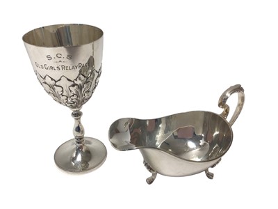Lot 93 - Good quality silver sauce boat by Cooper Bros. Sheffield 1935 together with a silver trophy cup, Cooper Bros. Sheffield 1921 (2)
