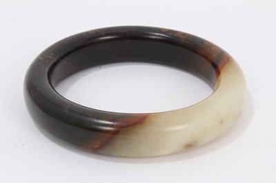 Lot 1053 - Chinese mottled jade bangle