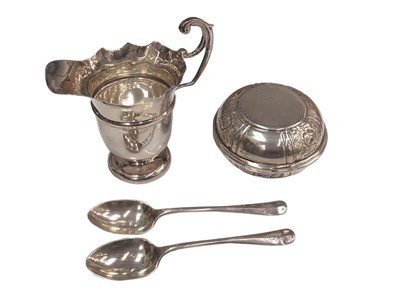 Lot 119 - Edwardian silver cream jug, two Britannia silver teaspoons and a Brighton bun style candlesticks