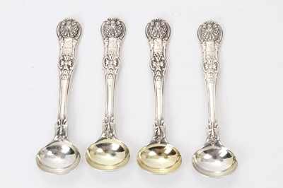 Lot 418 - Set of four rare Victorian Queens scroll rosette pattern silver salt spoons