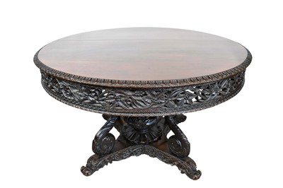 Lot 1560 - 19th century Ceylonese carved hardwood circular breakfast table