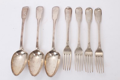 Lot 407 - Four George III silver Fiddle and Thread pattern table forks with engraved crests