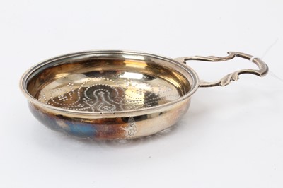 Lot 583 - Georgian silver lemon squeezer of circular form, with pierced bowl, engraved armori