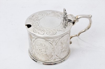 Lot 415 - Victorian silver drum mustard with engraved floral decoration