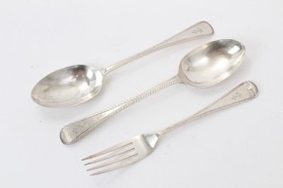 Lot 585 - A pair of Victorian Old English Feather Edge pattern silver table spoons and a matching dinner fork with engraved initials and dates (London 1872) Mappin & Webb. All at approximately 8ozs. (3)