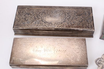 Lot 586 - Selection of Middle Eastern, Far Eastern and other silver and white metal, including four cigarette/cigar boxes, filligree dish, compact, mirror, candle holder and other items, some marked. (Qty)