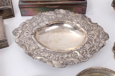 Lot 586 - Selection of Middle Eastern, Far Eastern and other silver and white metal, including four cigarette/cigar boxes, filligree dish, compact, mirror, candle holder and other items, some marked. (Qty)