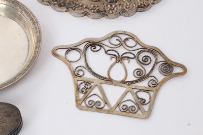 Lot 586 - Selection of Middle Eastern, Far Eastern and other silver and white metal, including four cigarette/cigar boxes, filligree dish, compact, mirror, candle holder and other items, some marked. (Qty)