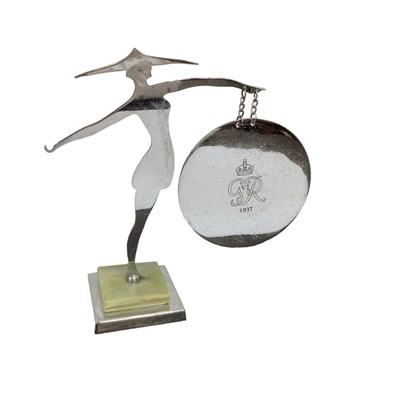 Lot 101 - Unusual 1930s King George VI Coronation commemorative table gong in the form of a chrome plated bathing beauty holding the gong with engraved crowned GR VI 1937 cipher on green onyx and chrome base...