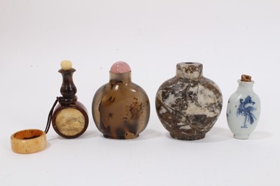 Lot 865 - Chinese faux agate snuff bottle, 6cm high, together with a hardstone snuff bottle, a porcelain snuff and horn snuff