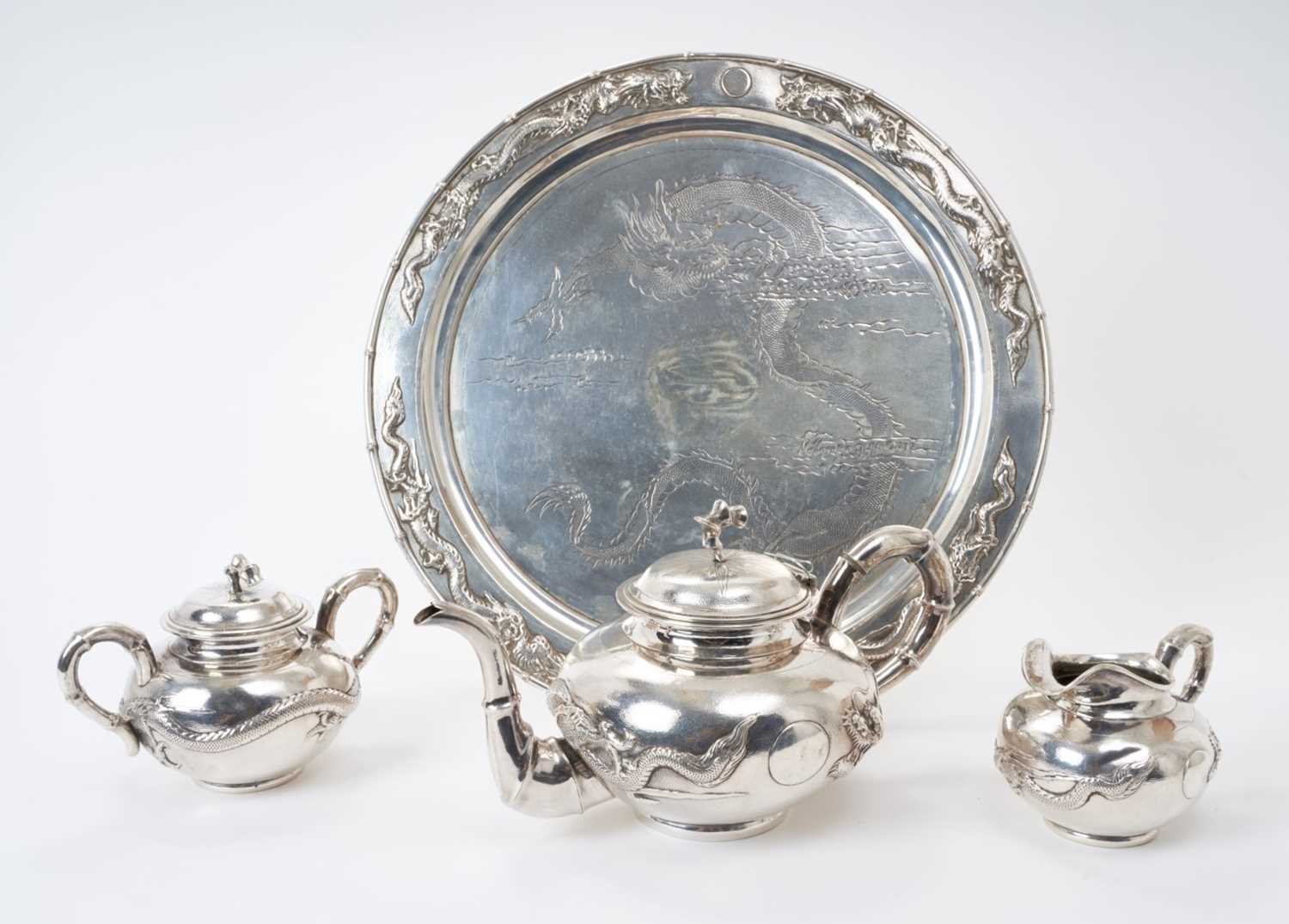 Lot 185 - Chinese silver four-piece tea set