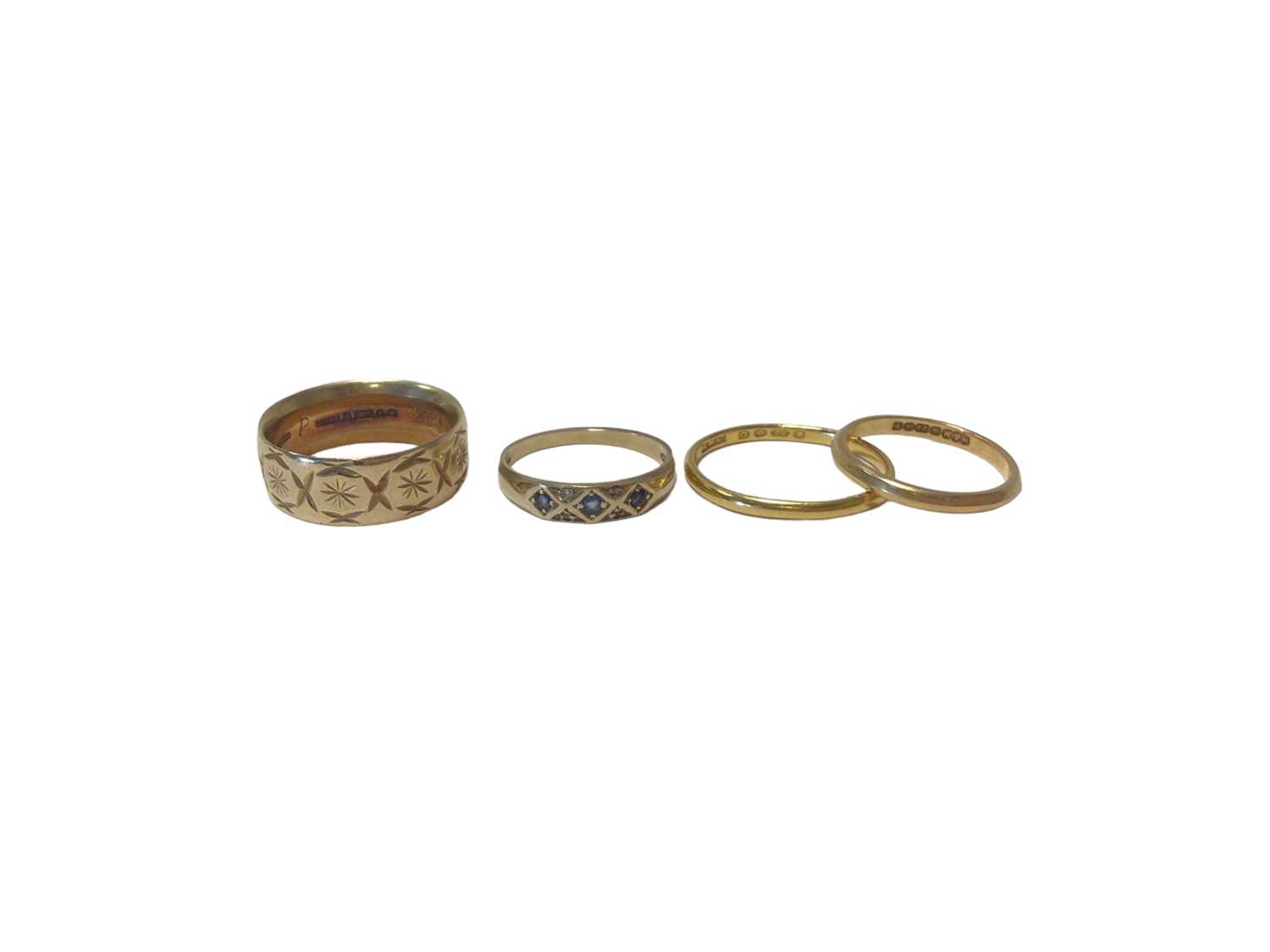 Lot 51 - Two 22ct gold wedding rings, 9ct gold wedding ring and a 9ct gold sapphire and diamond ring (4)