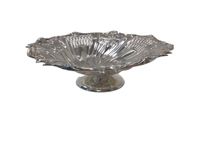 Lot 37 - Good Edwardian fluted silver pedestal dish, with pierced foliate and latticework decoration, and cast shell motif to rim, Sheffield 1907 (James Dixon & Sons), 23cm diameter, 14.4oz
