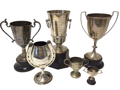 Lot 43 - Three sterling silver trophies of local interest, including two for horse shoeing (one in the shape of a horseshoe), one for Colchester Ridle Club, and one for golf, 42.8oz