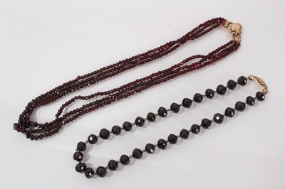 Lot 320 - Two antique garnet bead necklaces