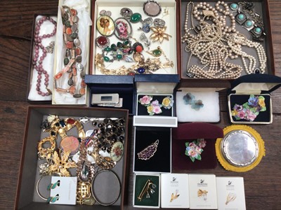 Lot 66 - Vintage costume jewellery to include a silver powder compact, coral and silver dress ring, vintage brooches, Trifari necklace, silver and green stone bracelet etc