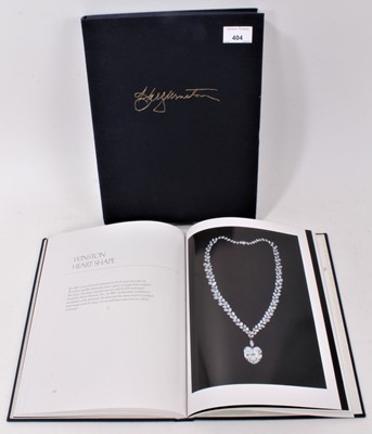 Lot 404 - Harry Winston 'The Ultimate Jeweler' by Laurence Krashes, signed by the author, boxed.