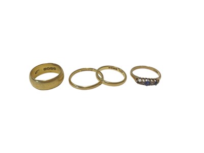 Lot 89 - Three 22ct gold wedding rings and an 18ct gold sapphire and diamond ring with missing stone (4)