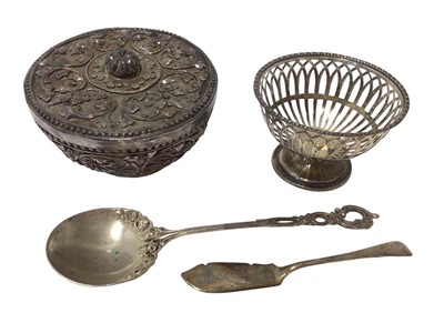 Lot 95 - Indian silver covered bowl decorated with a foliate pattern in relief, 11cm diameter, a silver basket and fish knife, and an .800 silver spoon, 8oz in total