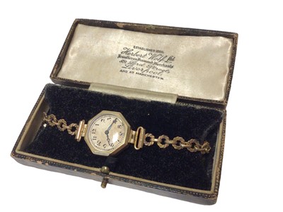 Lot 101 - Vintage 9ct gold cased wristwatch on a gold plated bracelet