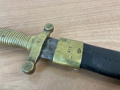 Lot 869 - 19th Century French 1831 Pattern 'Gladius' Short Sword, with ribbed brass hilt and steel blade, in leather scabbard with brass mounts, crossguard and scabbard stamped '415'.