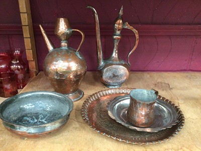 Lot 671 - Group of Middle Eastern copper ware