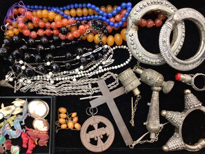 Lot 1019 - Group of Eastern jewellery including bangles, a ring etc, various bead necklaces, silver rope twist necklace, one other silver chain, Chinese white metal dragon brooch