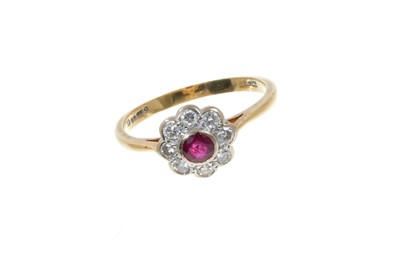 Lot 314 - Ruby and diamond daisy cluster ring