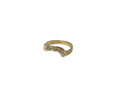 Lot 138 - 18ct gold and diamond ring, the shaped band with three brilliant cut diamonds