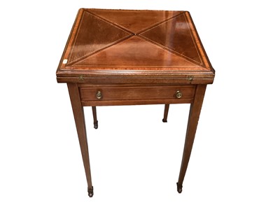 Lot 1220 - Edwardian inlaid mahogany envelope top card table