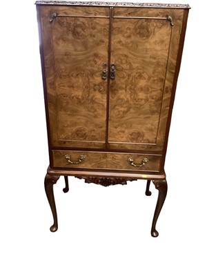 Lot 1229 - Good quality Queen Anne style cocktail cabinet with fitted interior enclosed by glazed door with drawer on carved cabriole legs