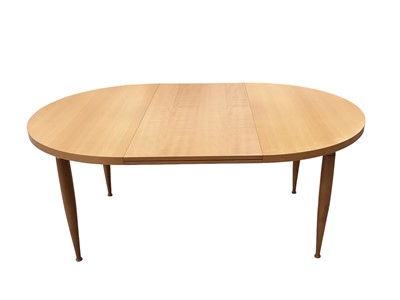 Lot 1287 - Good quality Heal's 'Finn' beech stained pear wood dining table with one leaf