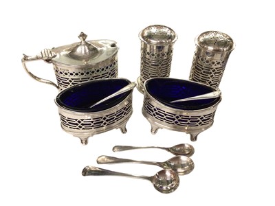 Lot 1005 - Five piece silver condiment set with blue glass liners and five various silver salt spoons